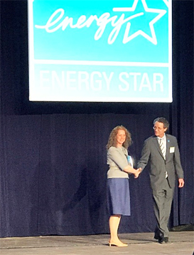 Angela Aeschliman, CPM, CCIM, LEED AP ND, Sustainability Advisory Board chair, accepts IREM’s 2018 ENERGY STAR Partner of the Year award from Bill Wehrum, assistant administrator, Office of Air and Radiation, U.S. EPA